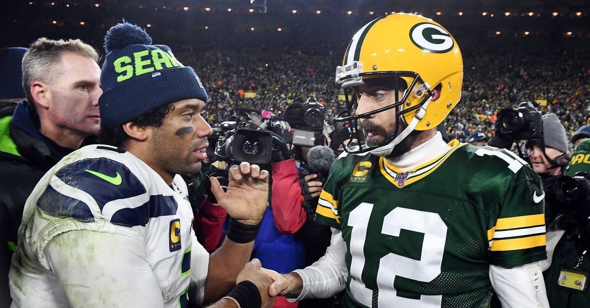 Aaron Rodgers et Russell Wilson regardent le record douteux de la NFL